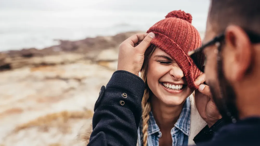 Woman wearing winter hat.
